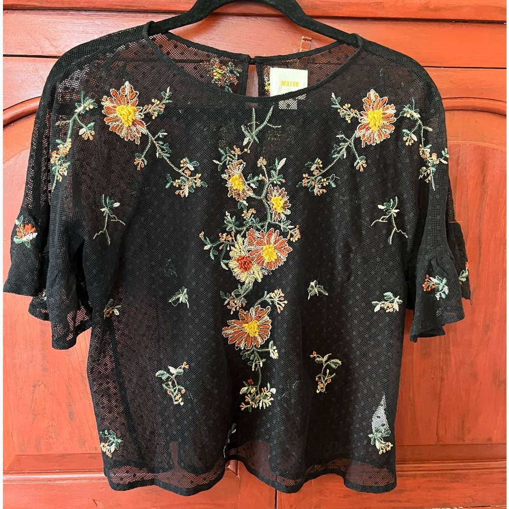 Beautiful feminine Anthropologie - Maeve brand blouse with flutter sleeves.